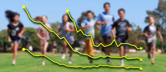 Blurred photo of kids running with a downward trending graph overlay